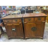 A pair of oriental style wood cabinets