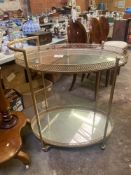 A gilt framed cocktail trolley