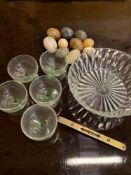 Ten onyx eggs, brass and steel spirit level and a quantity of glassware