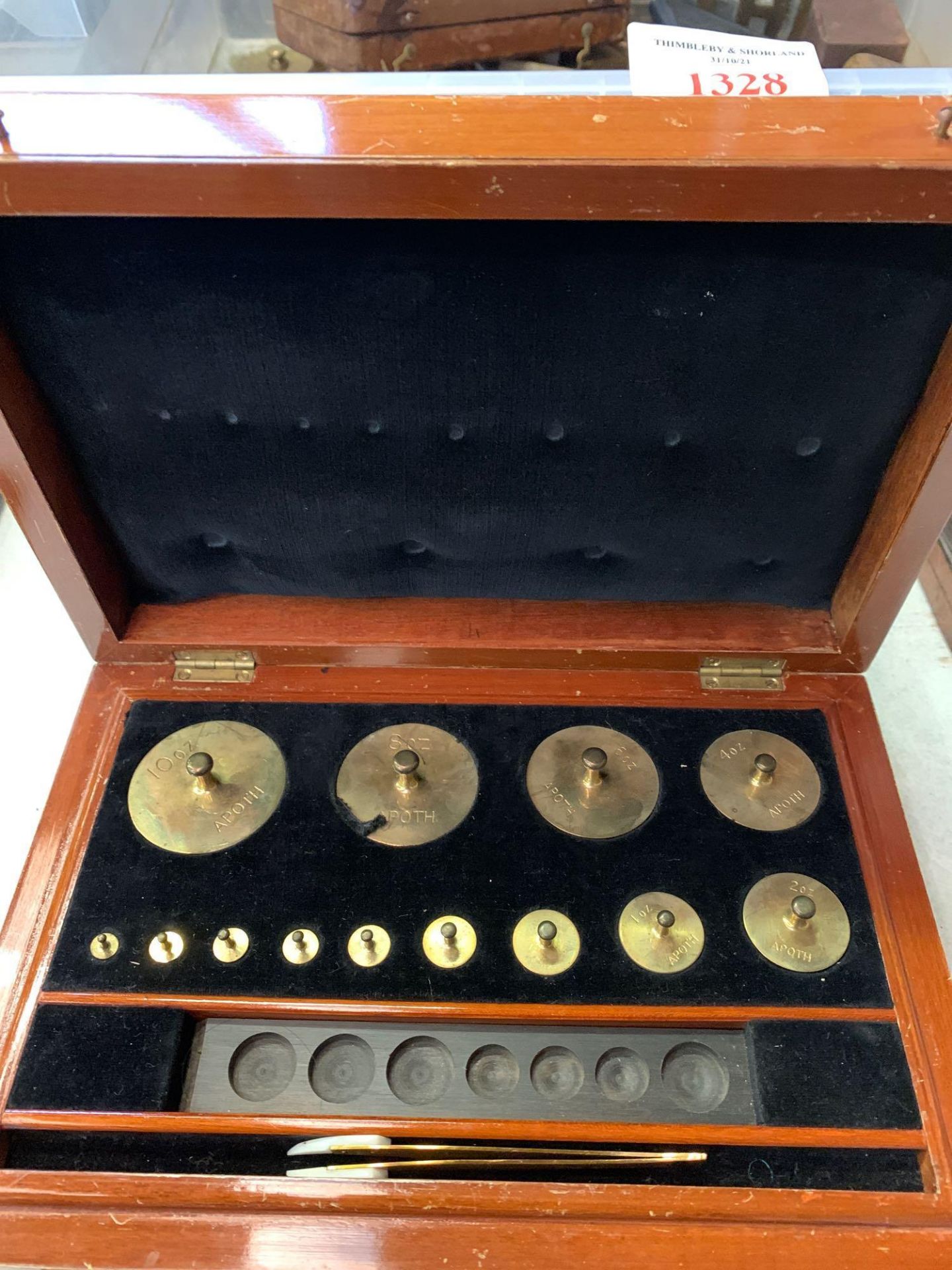 Three part boxed set of standard brass apothecary weights by Avery De Grave