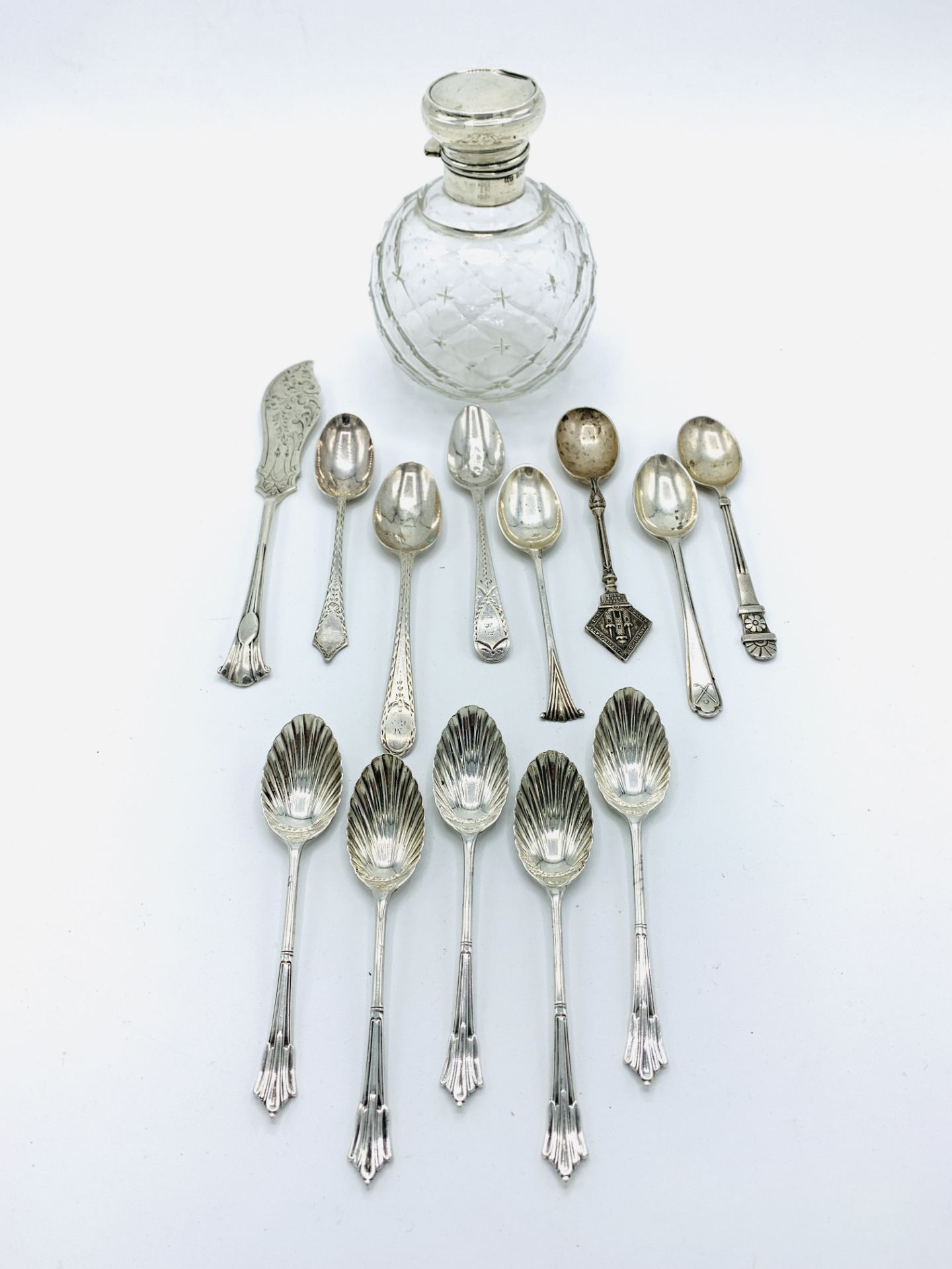 A quantity of silver teaspoons and other items
