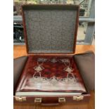 Tooled leather photograph album in leather effect briefcase