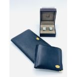 A pair of Dunhill cufflinks and two Dunhill black leather wallets