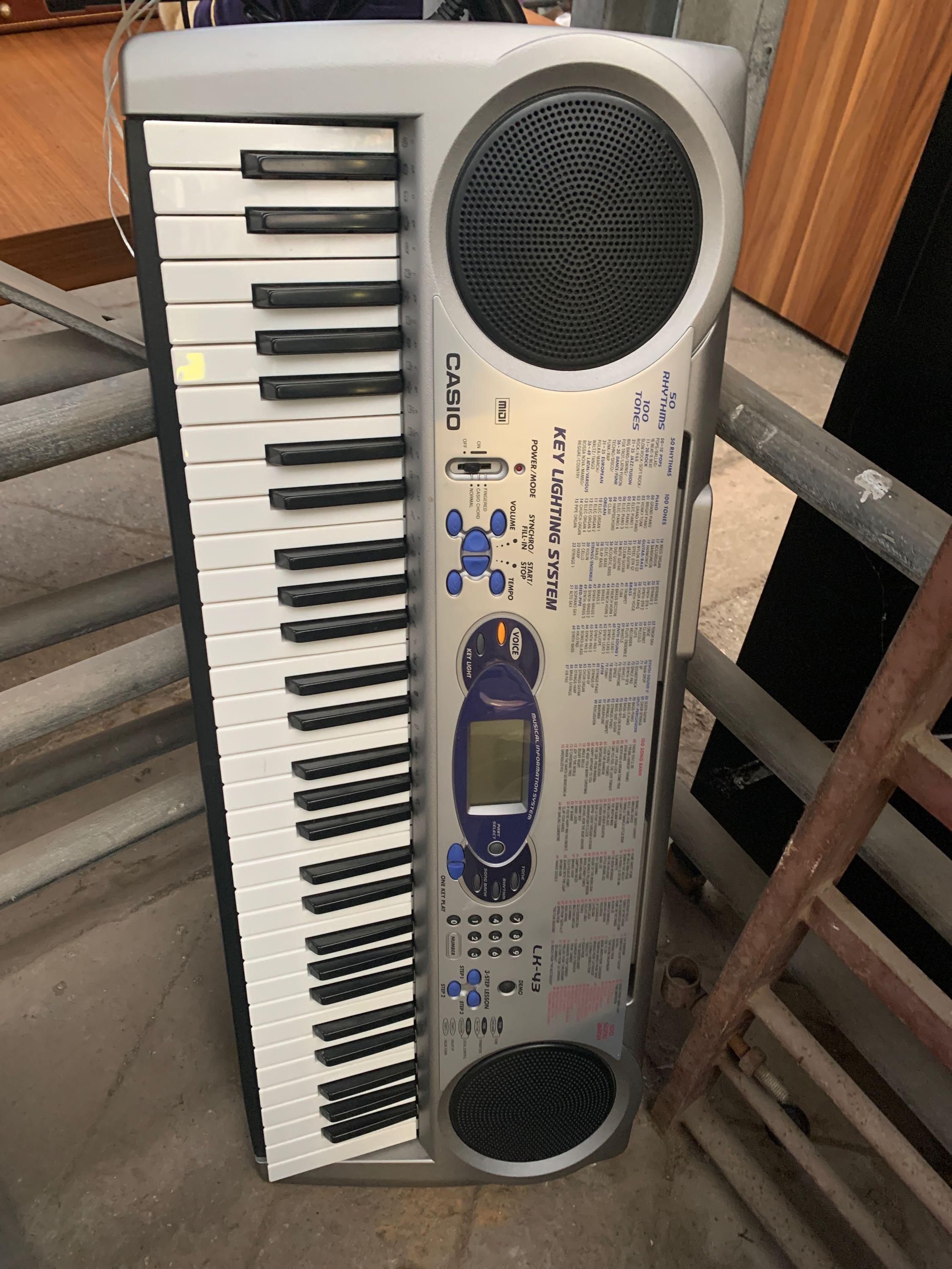 Casio keyboard on stand