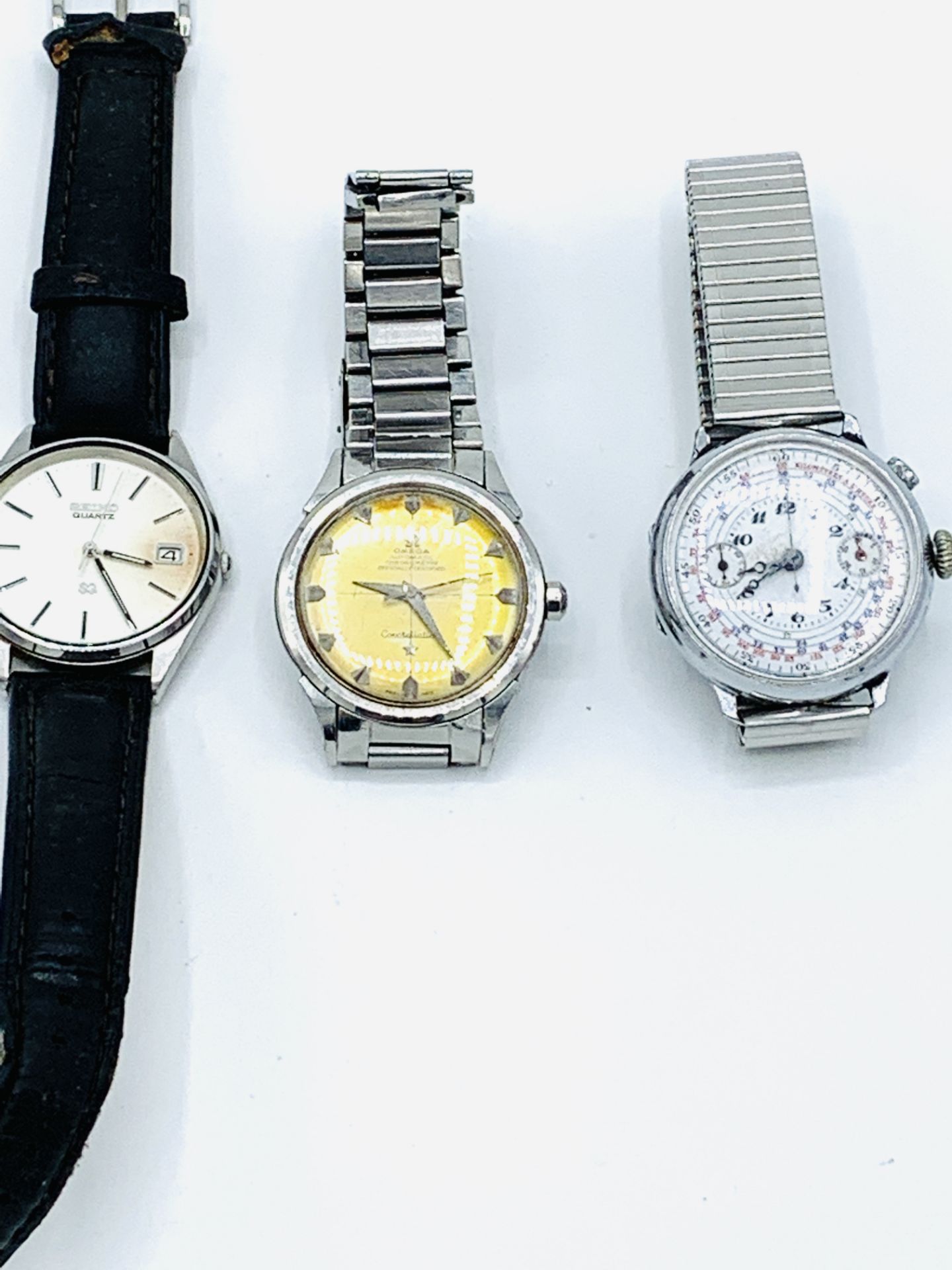 Omega Constellation Automatic Chronometer, and two other wrist watches