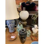 Blue and white table lamp; together with an oil filled lamp and other items