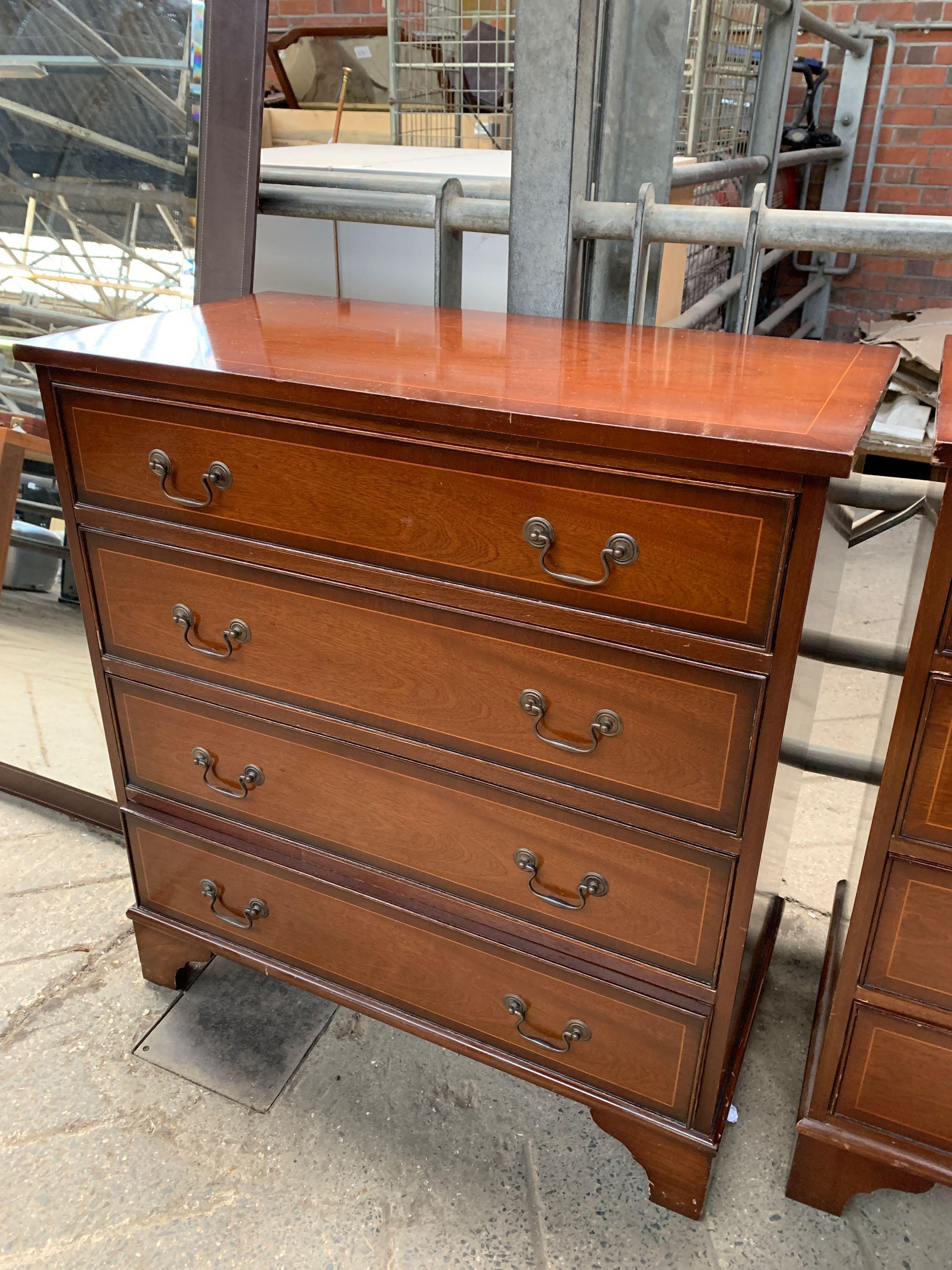 Two wood veneer chest of drawers