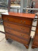 Two wood veneer chest of drawers