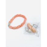 Coral twisted bracelet and a pair of coral and synthetic pearl drop earrings