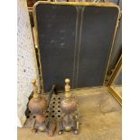 Steel and brass firedogs and three fire screens