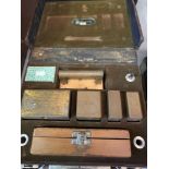 Two boxes of standard brass weights by Reverifications Ltd