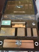 Two boxes of standard brass weights by Reverifications Ltd