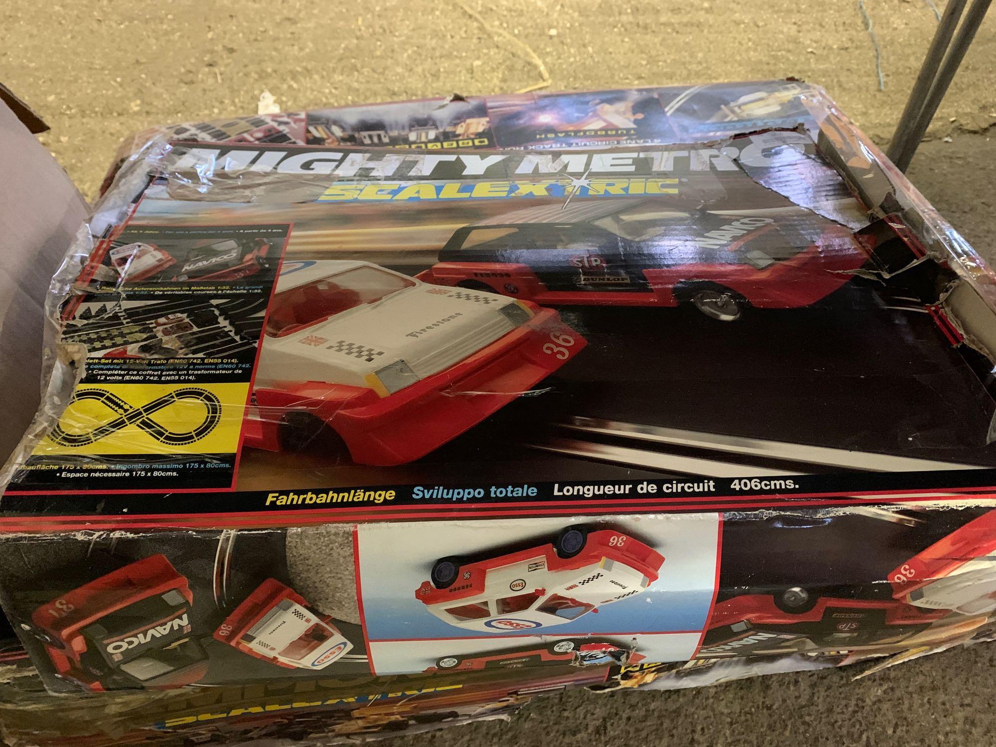 Two sets of boxed Scalextric and a quantity of track