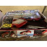 Two sets of boxed Scalextric and a quantity of track