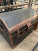 A dome top trunk together with a French hat box