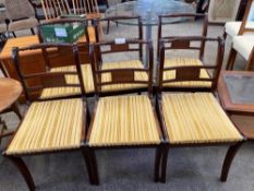 Six mahogany dining chairs