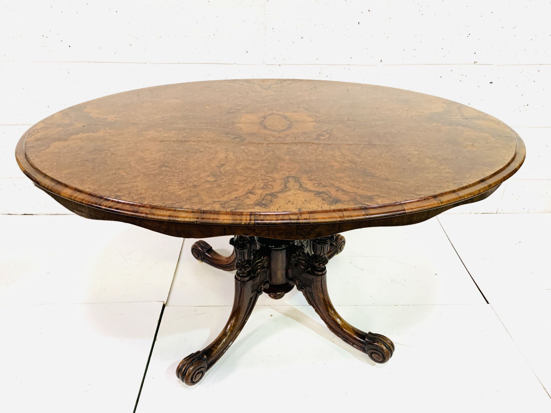 Walnut oval tilt top table