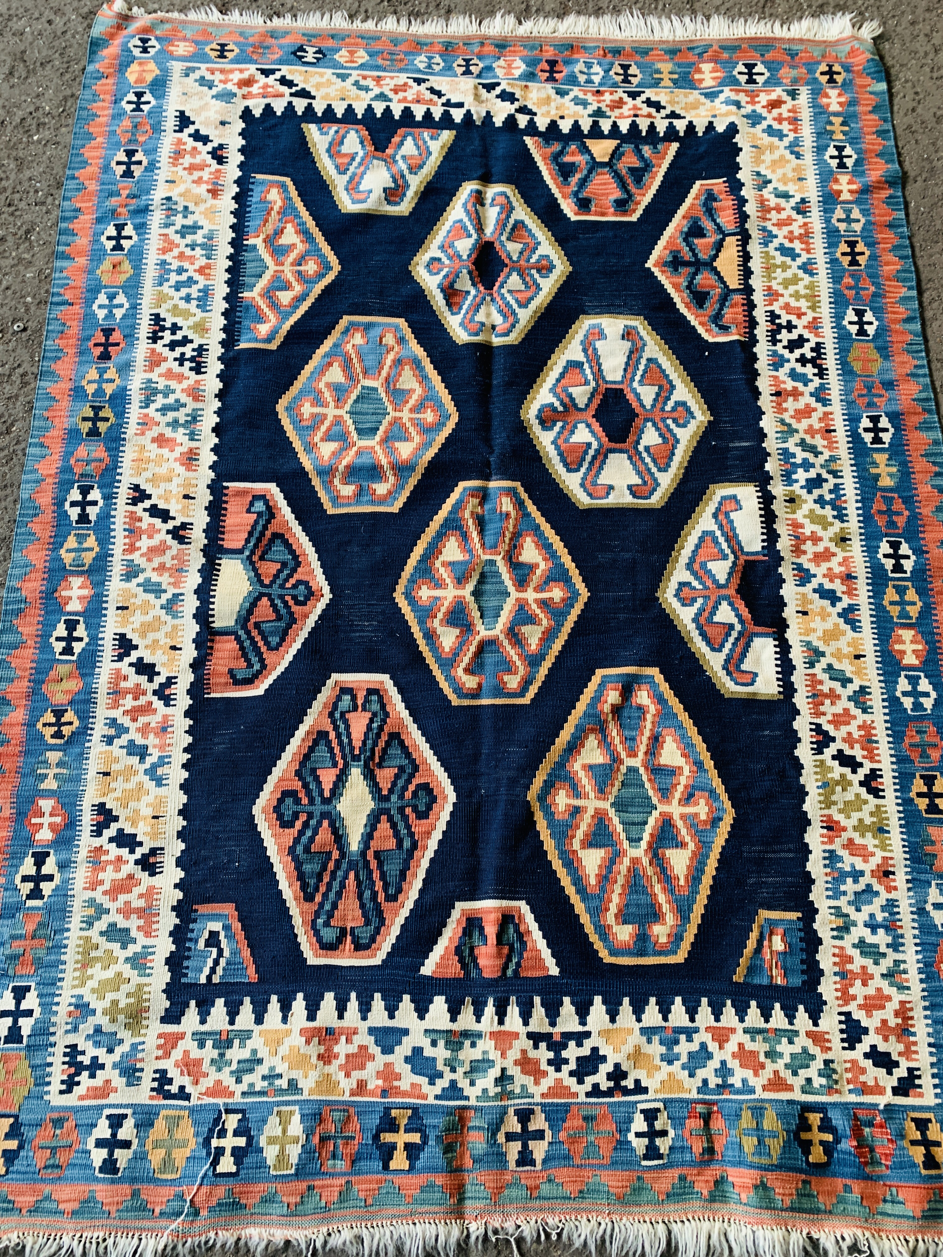 Blue ground geometric pattern rug,