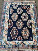 Blue ground geometric pattern rug,