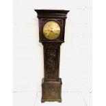 Carved oak longcase clock, the brass face written Massey, Newcastle