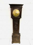 Carved oak longcase clock, the brass face written Massey, Newcastle