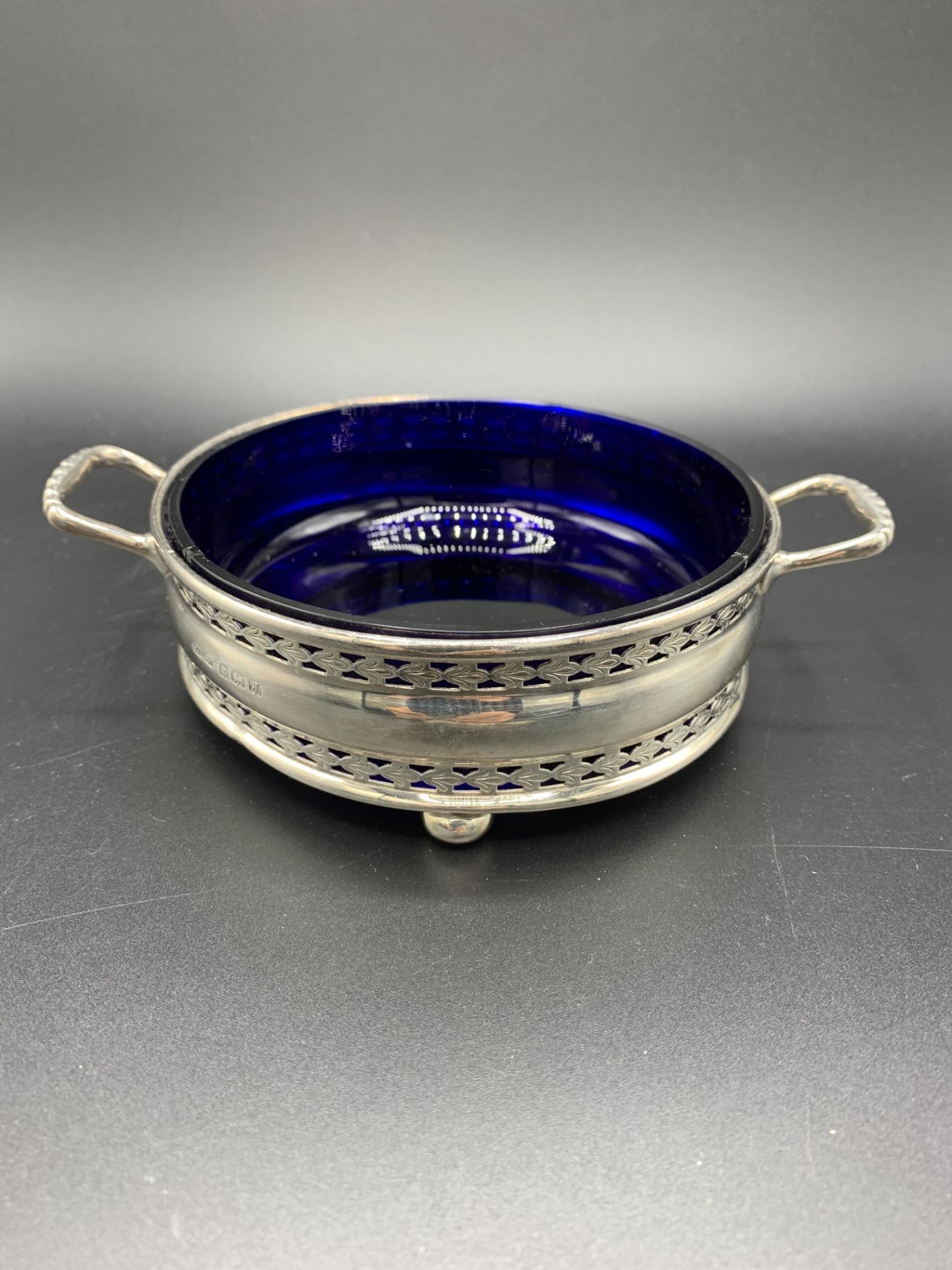 A silver mounted circular glass stand by Mappin & Webb and a silver two handled three footed dish - Image 4 of 4