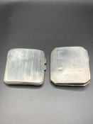 Two hallmarked silver machine turned cigarette cases