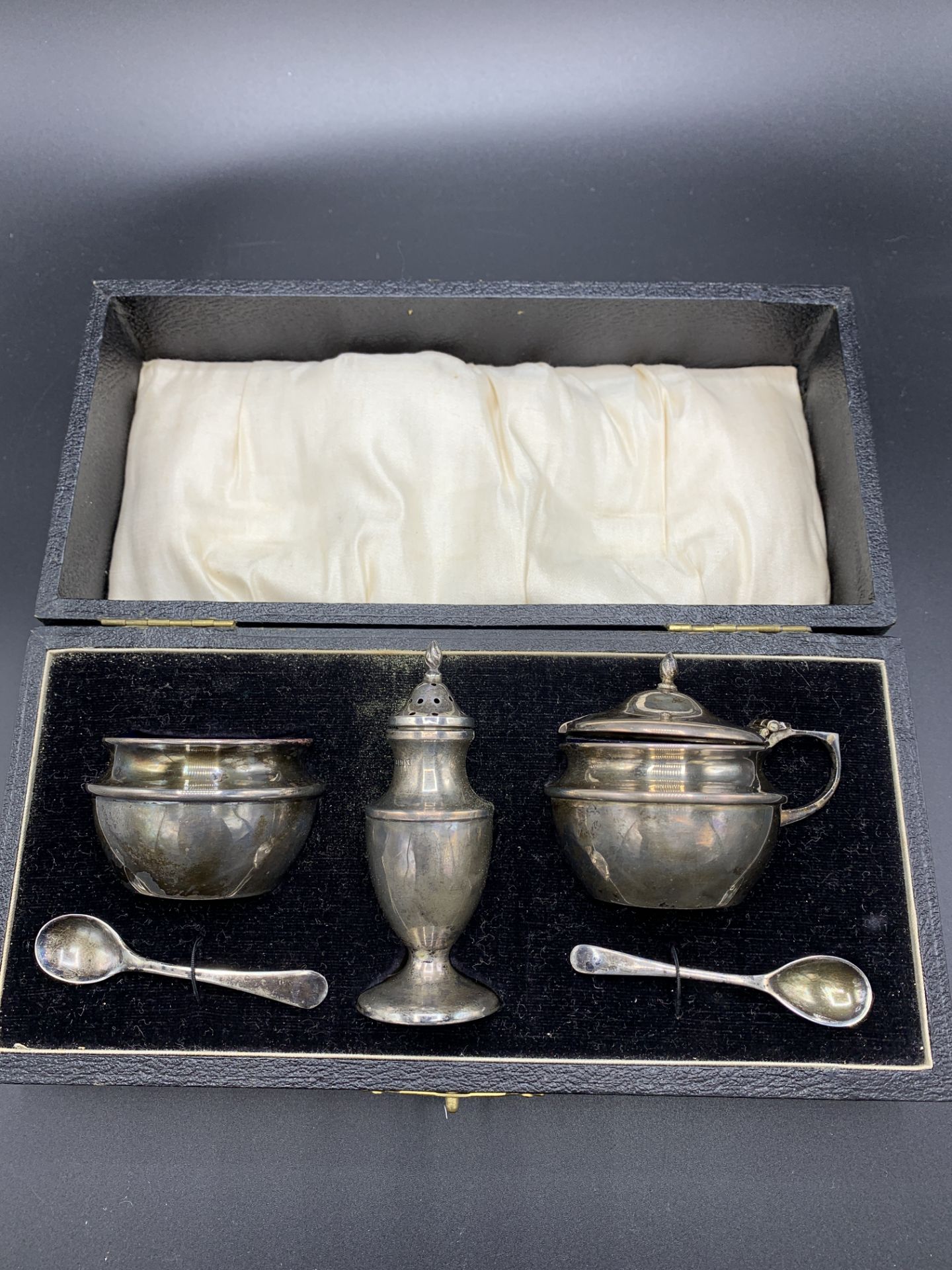 A silver cruet set