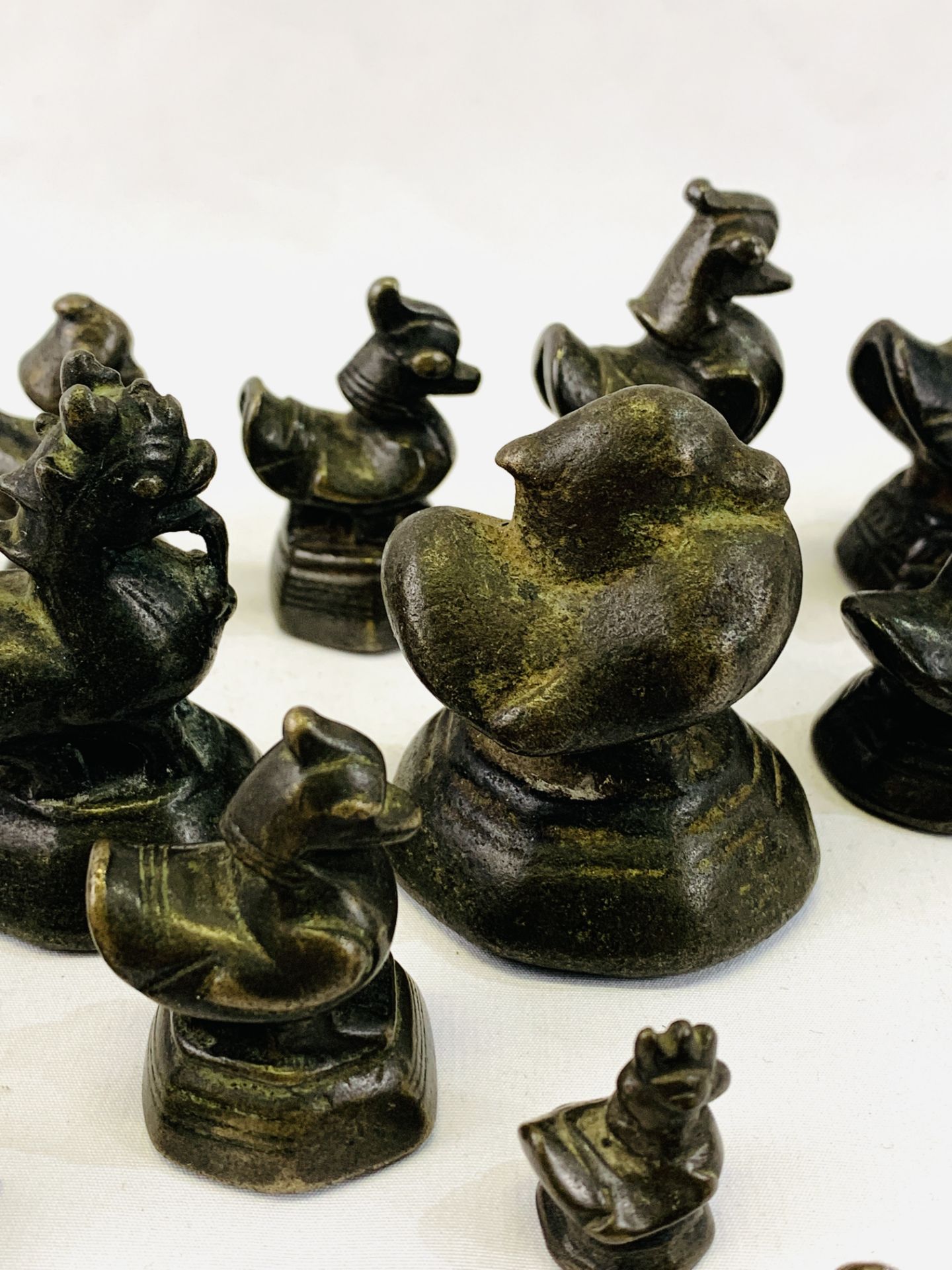 Twelve Chinese bronze opium weights - Image 7 of 7