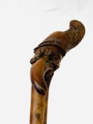 Carved wood walking stick