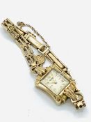 Rotary 9ct gold case wrist watch on 9ct gold gate link bracelet strap