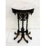 Ornately carved marble topped display table