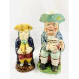 Early 19th Century Staffordshire ordinary Toby jug with foaming jug of ale, and another