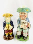Early 19th Century Staffordshire ordinary Toby jug with foaming jug of ale, and another