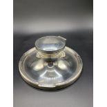 A large silver capstan shaped inkwell by A & J Zimmerman Ltd