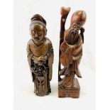 Two carved Oriental figures