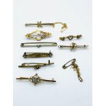 Five 9ct gold bar brooches and 3 other bar brooches