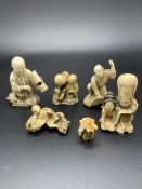 A collection of 3 Japanese carved ivory figurines and 2 netsukes