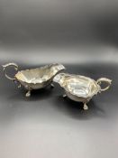 Silver plate entree dish, two handled footed bowl and two sauce boats