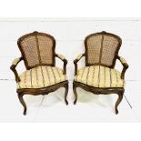Pair of French style open arm chairs