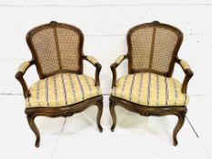 Pair of French style open arm chairs