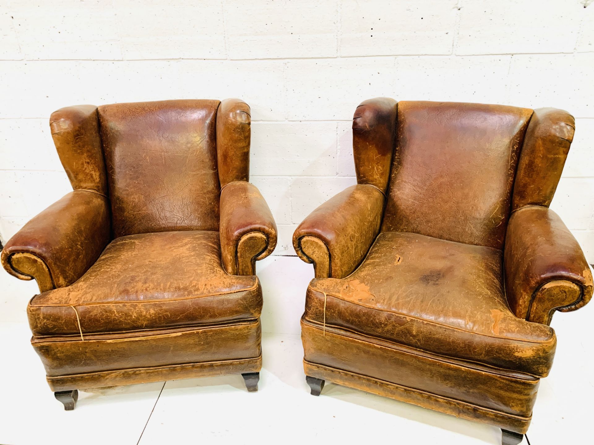 A pair of French brown leather wing back armchairs - Image 3 of 5