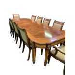 Walnut and mahogany veneer extendable dining table by Charles Barr Furniture with 10 chairs