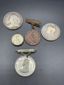 1821 Crown coin, an 1897 Crown coin, and 2 medals