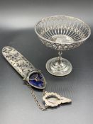 A silver and blue velvet lined chatelaine spectacle case