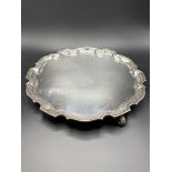 A silver scallop edge three footed tray by Adie Brothers Ltd