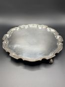 A silver scallop edge three footed tray by Adie Brothers Ltd