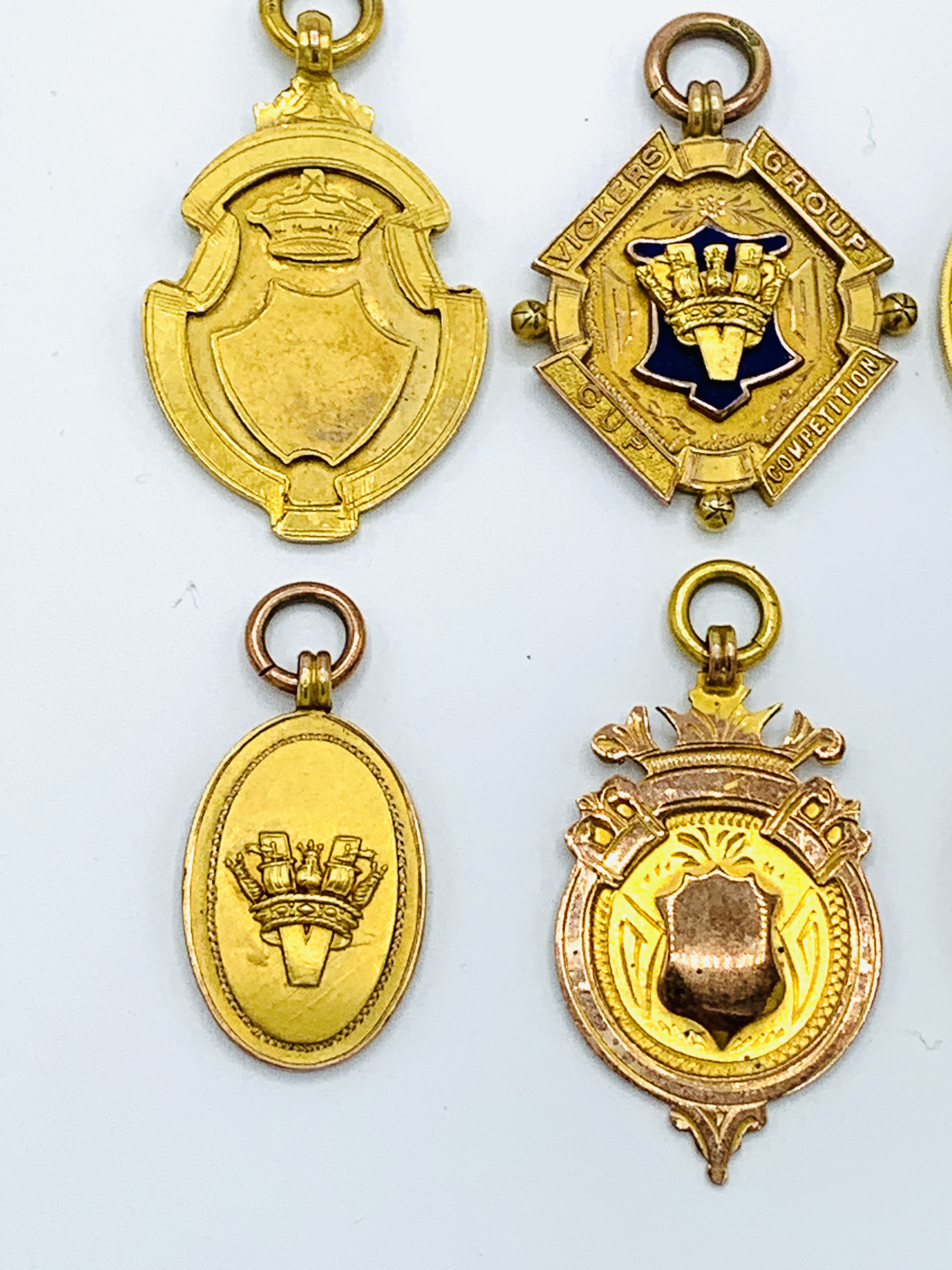 Five 9ct gold football medals plus another - Image 2 of 4