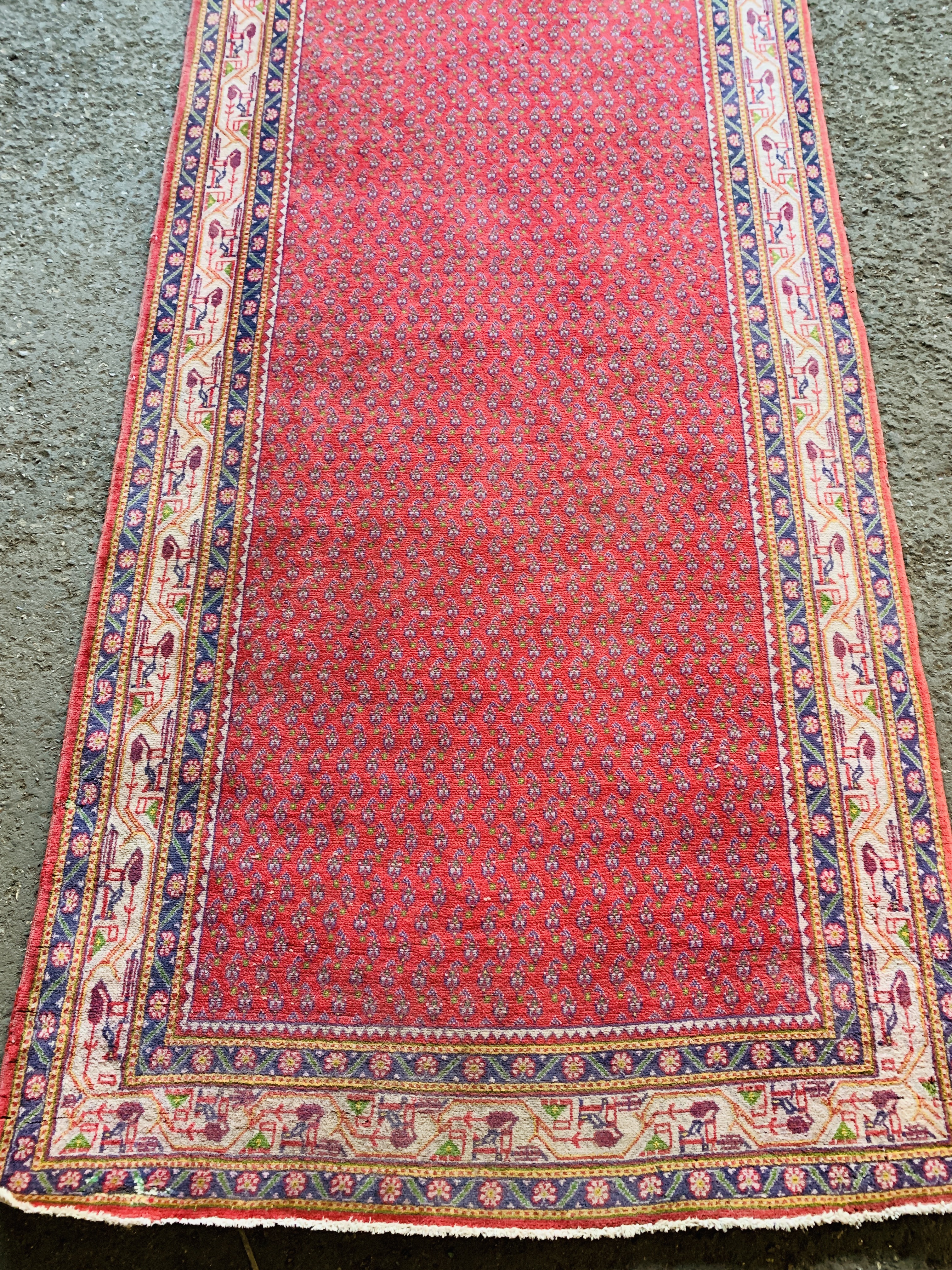 Red ground Iranian wool runner