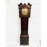 Early to mid-eighteenth century mahogany long case clock with brass face engraved R Maddock, Leek,